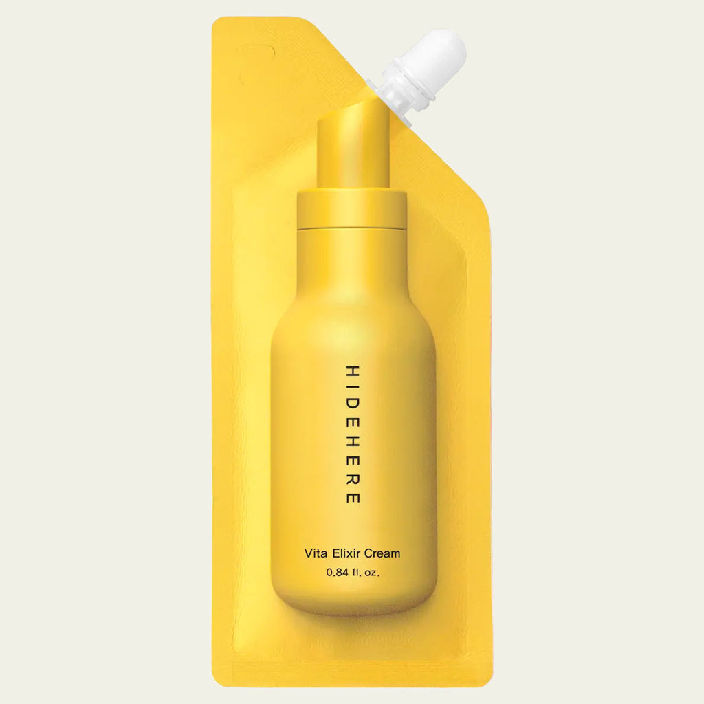 Hidehere Vita Elixir Cream 25 ml, crema facial iluminadora con vitaminas en envase flexible con boquilla